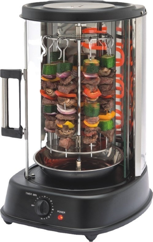 Studio shot of black rotisserie with skewers holding meat and vegetables, orange heating elements visible behind glass and