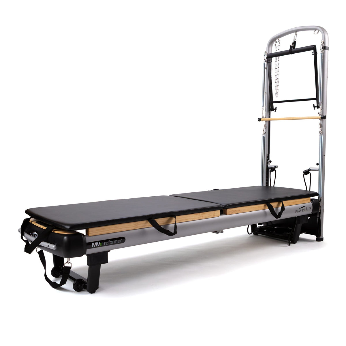 High-angle view of split black padding, natural wood grain rails, and tower assembly with hanging chains