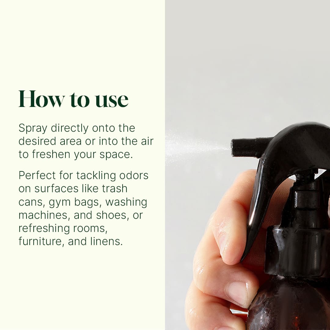 Close-up of black spray nozzle emitting mist next to usage instructions text