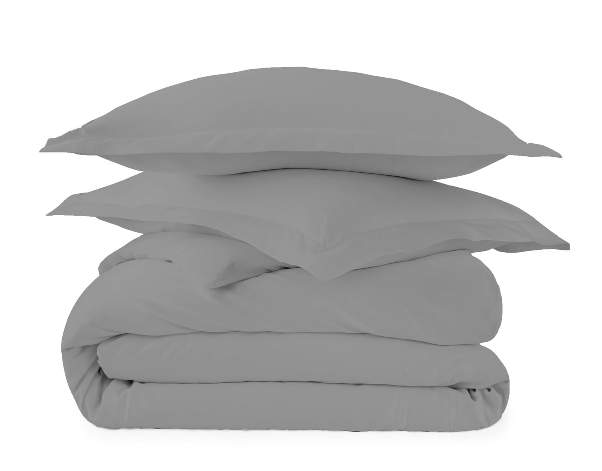 Medium grey duvet cover set with pillow shams showing soft drape and button closure