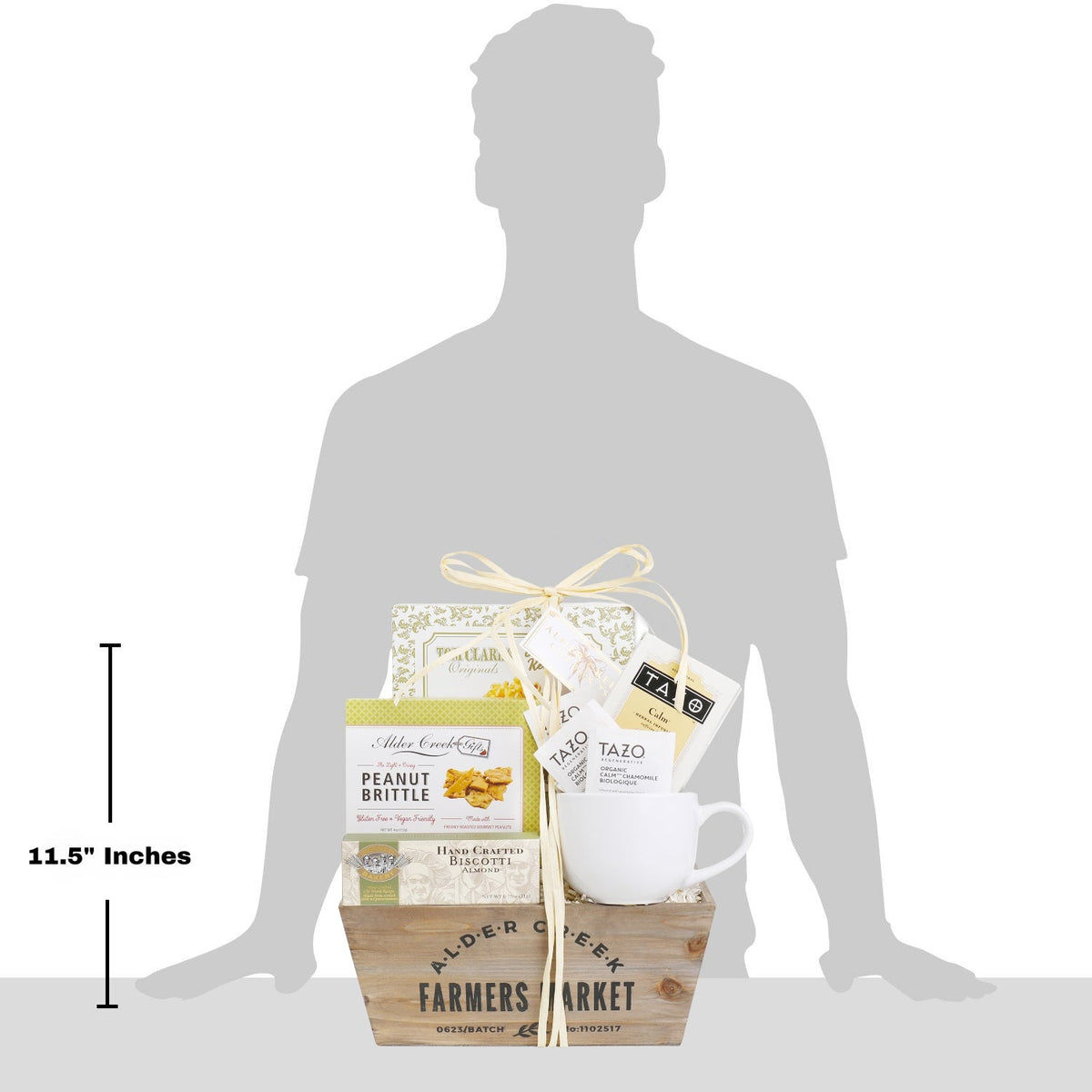 Gift basket next to grey human silhouette showing height measurement line indicating 11.5 inches total size
