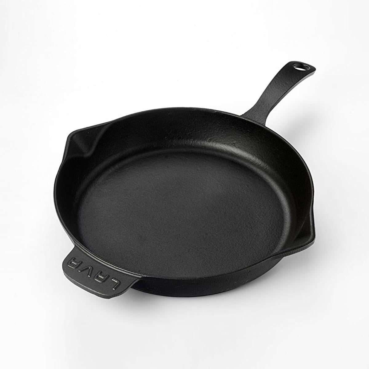 High-angle shot of textured black exterior on 28cm cast iron frying pan