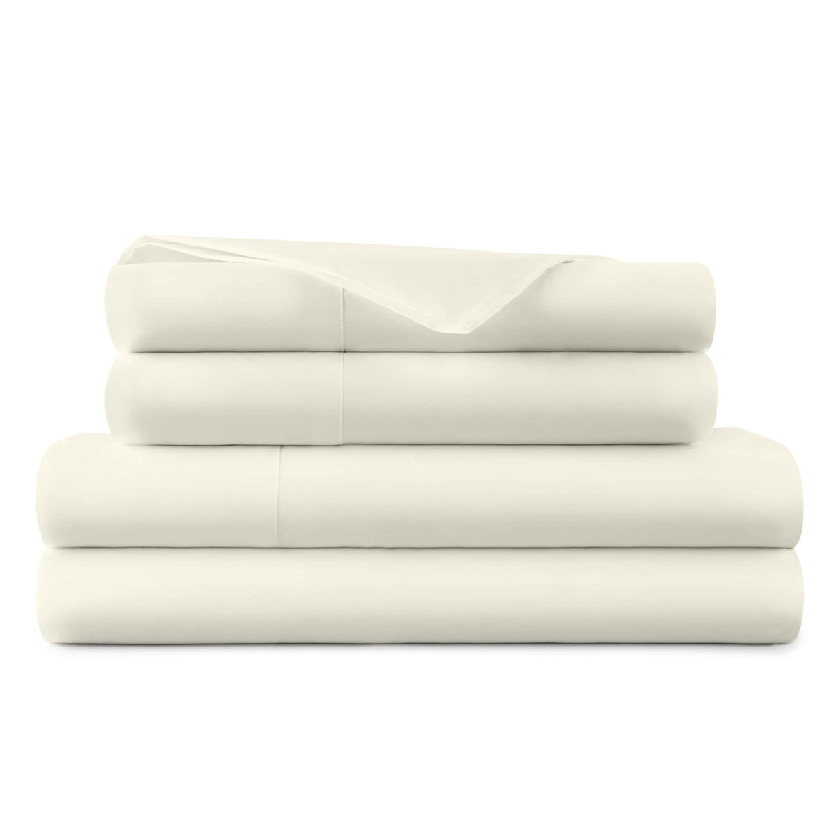Stack of cream 270 TC percale sheets angled to show soft organic cotton finish
