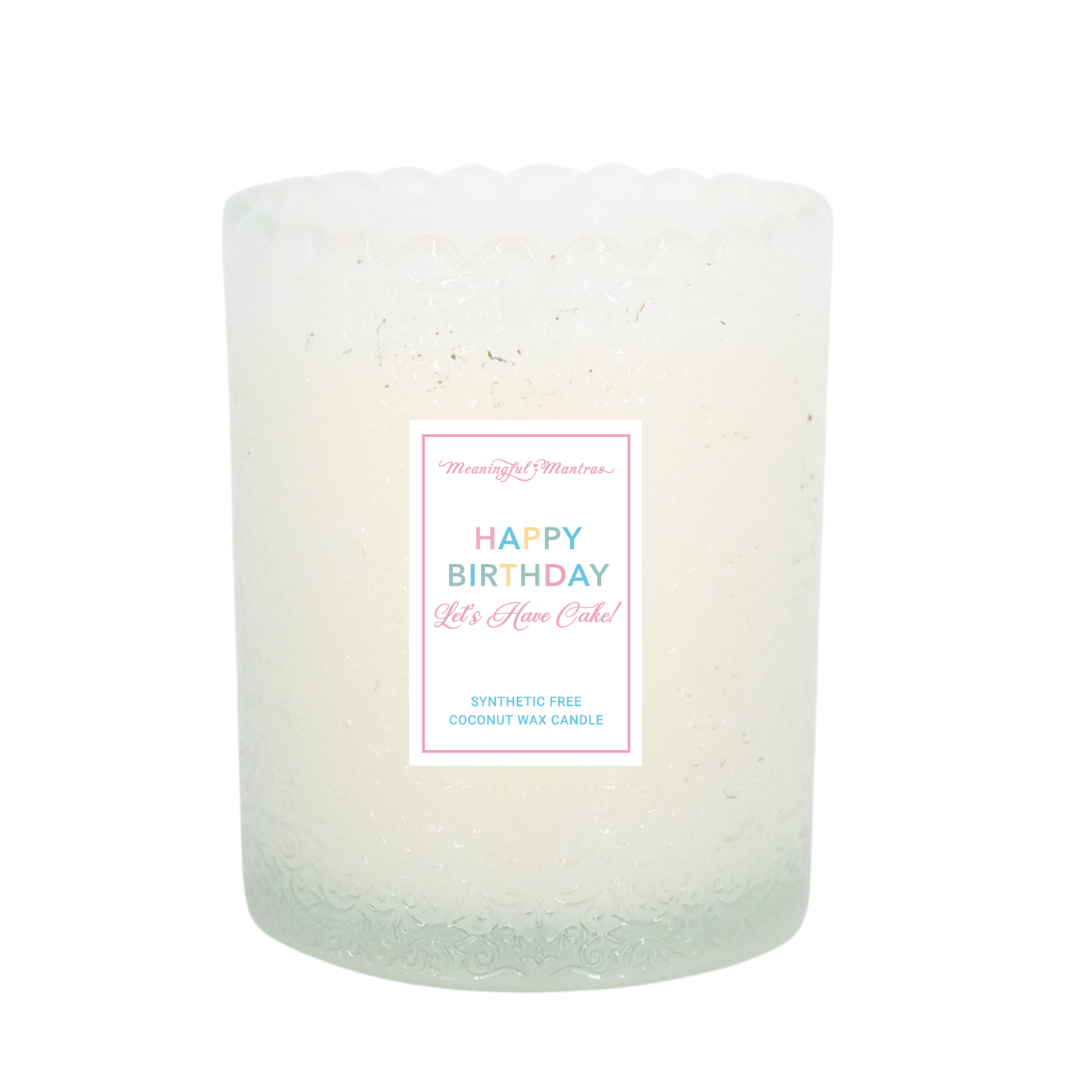 Close-up of white frosted glass jar showing intricate lace-like embossed texture and scalloped edge
