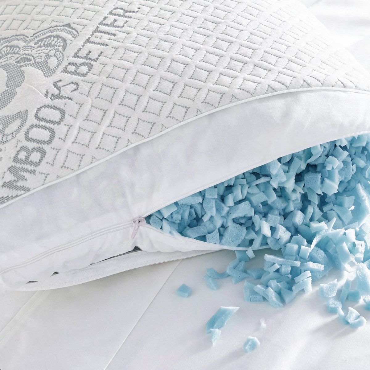Unzipped inner zipper revealing light blue shredded gel-infused memory foam filling
