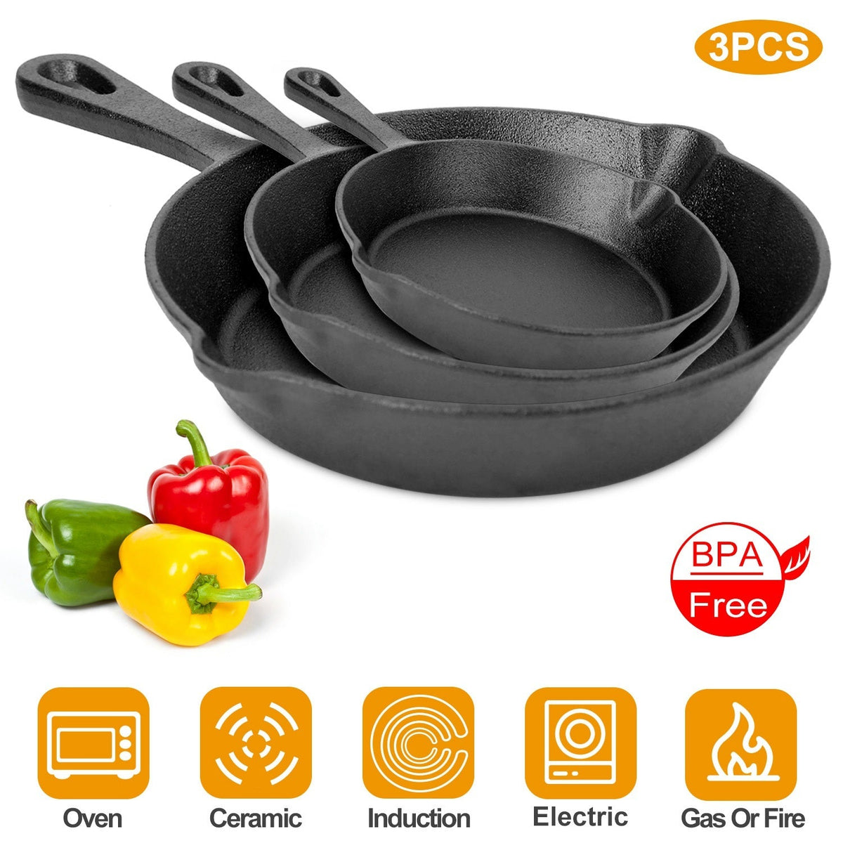 Three nested black cast iron skillets with red, yellow, and green peppers beside them on white background