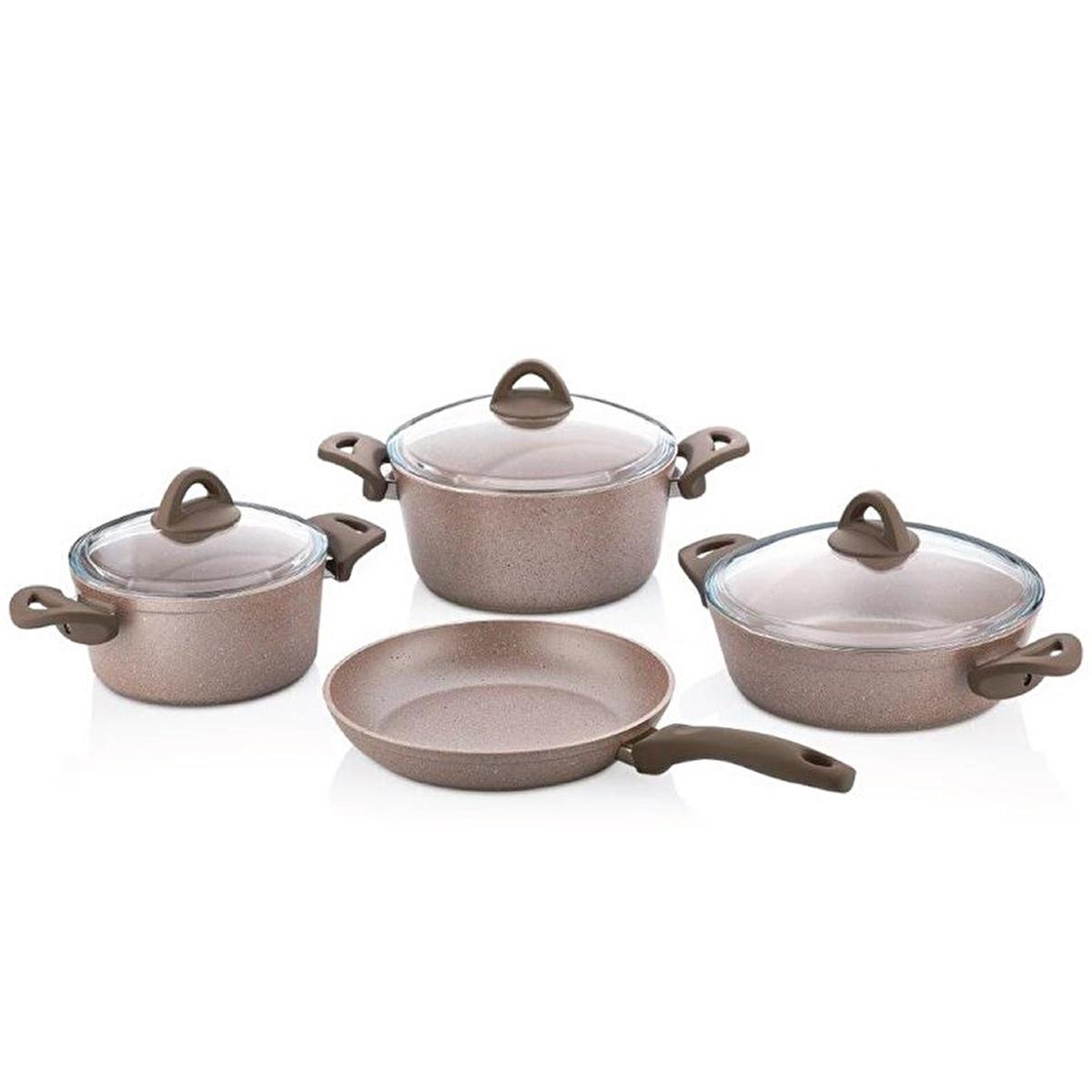 Speckled beige non-stick cookware set with glass lids and brown handles on white background
