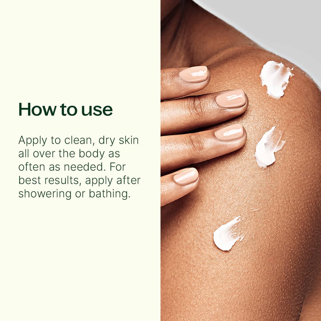Hand applying three dollops of white lotion to shoulder with nude nails