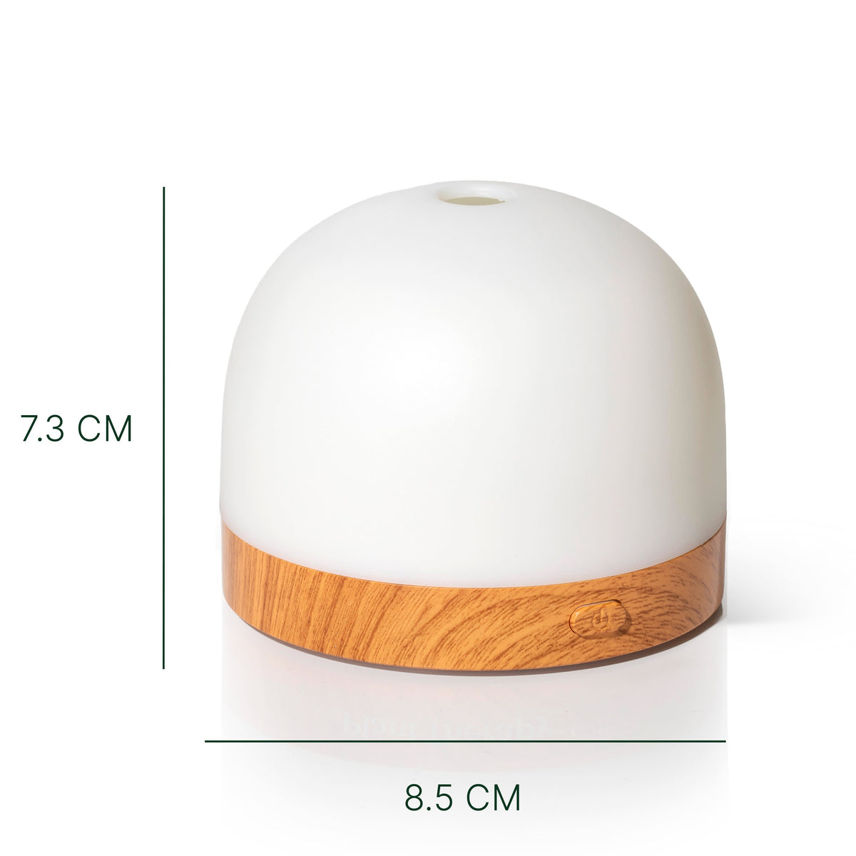 Technical dimension shot of AuraDrop diffuser showing black measurement lines for height and width on white background