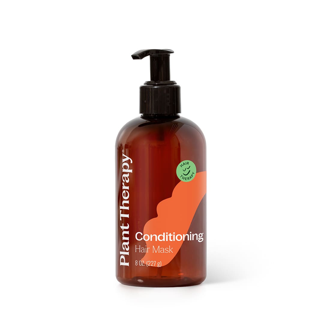 Brown amber pump bottle with orange wave design and green logo on white background