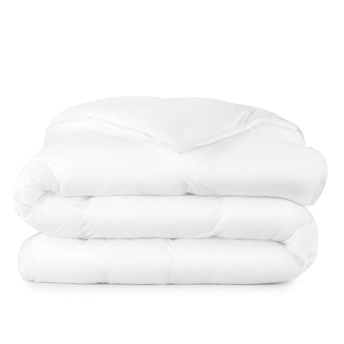 Plush white down alternative comforter folded on white background showing smooth organic cotton percale exterior