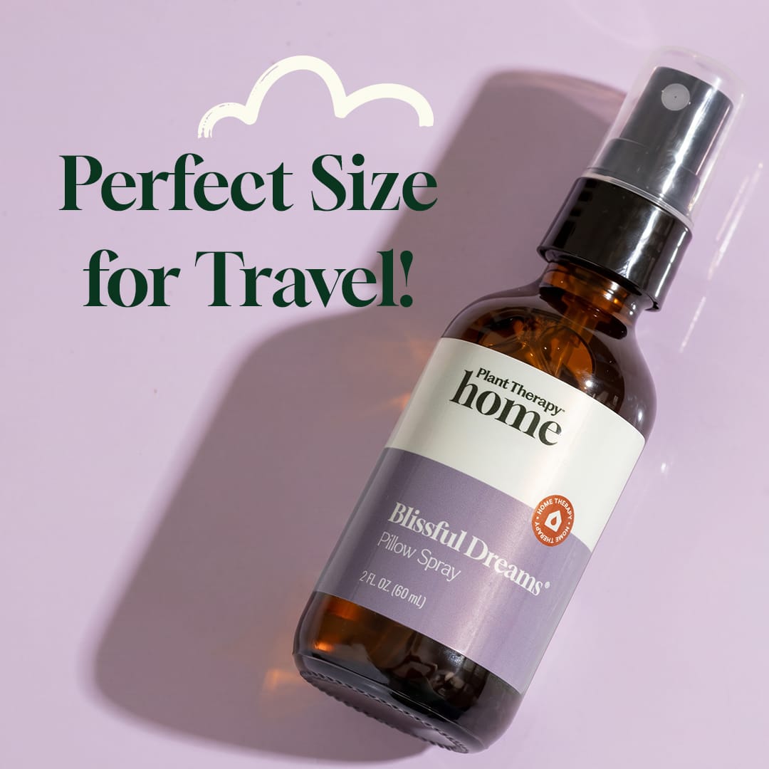 Travel size lavender pillow spray bottle on lavender background with cloud graphic
