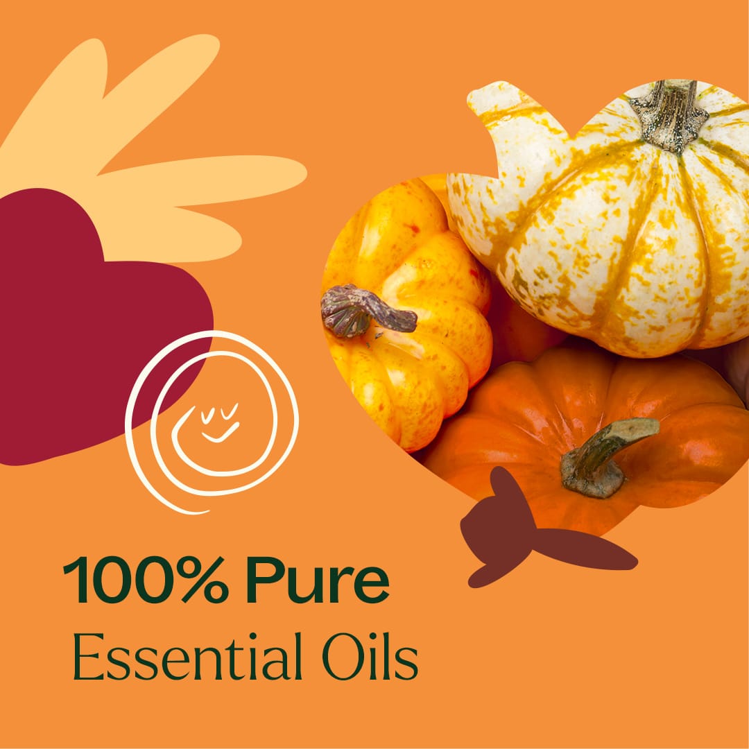 Cluster of orange and speckled white pumpkins with maroon leaf shapes and '100% Pure Essential Oils' text on an orange