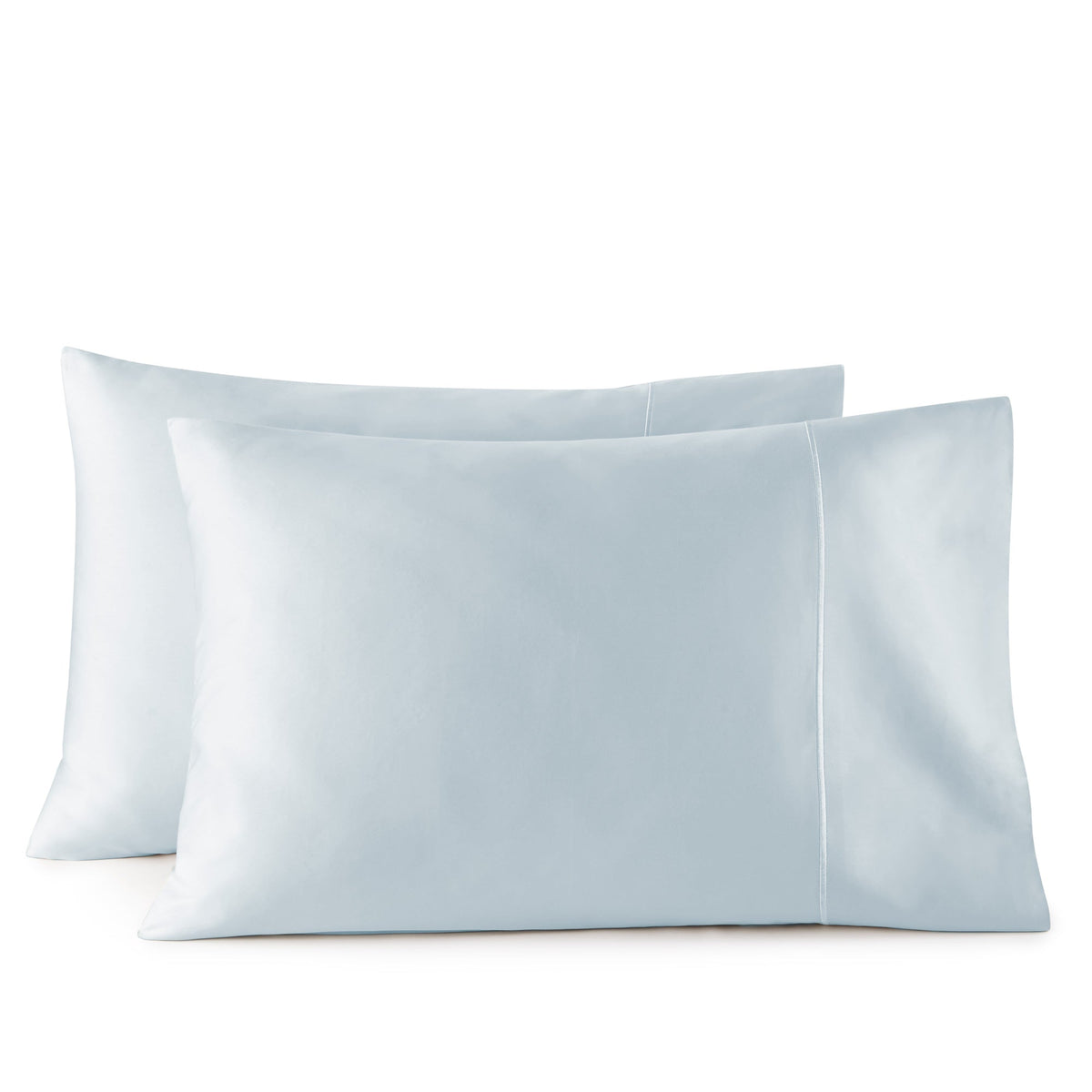 Light blue sateen pillowcases with vertical seam on white background