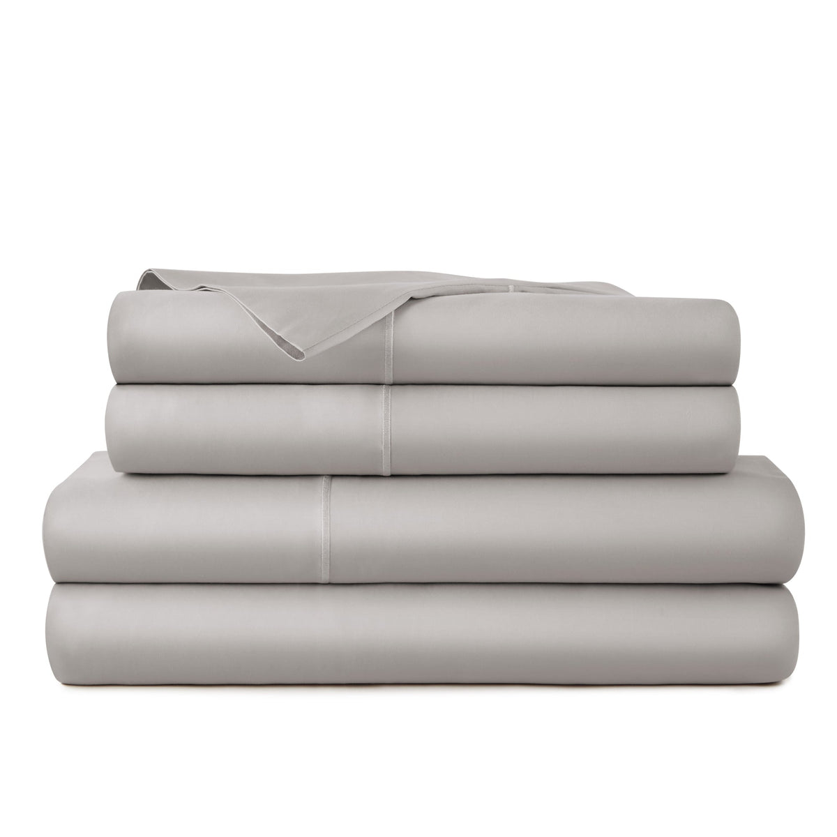 Pile of folded taupe bed sheets displaying luxurious satin-like surface, visible seam detailing, and gentle fabric drape