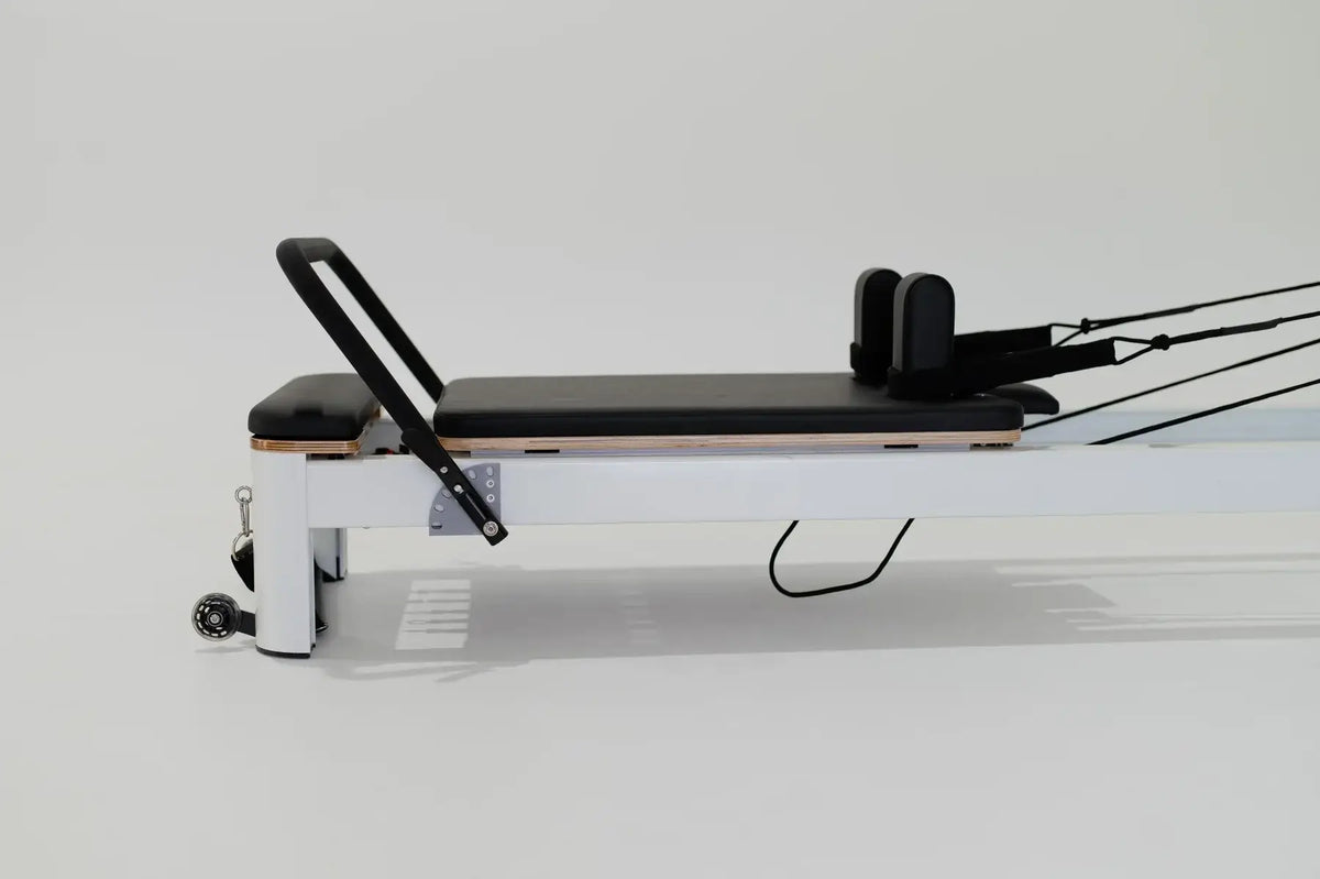 Close-up of black adjustable shoulder rests and folding metal frame mechanism